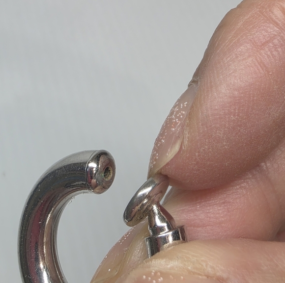 Silver toned puffy hoop huggie clip on retractable comfort Earrings - Picture 3 of 11